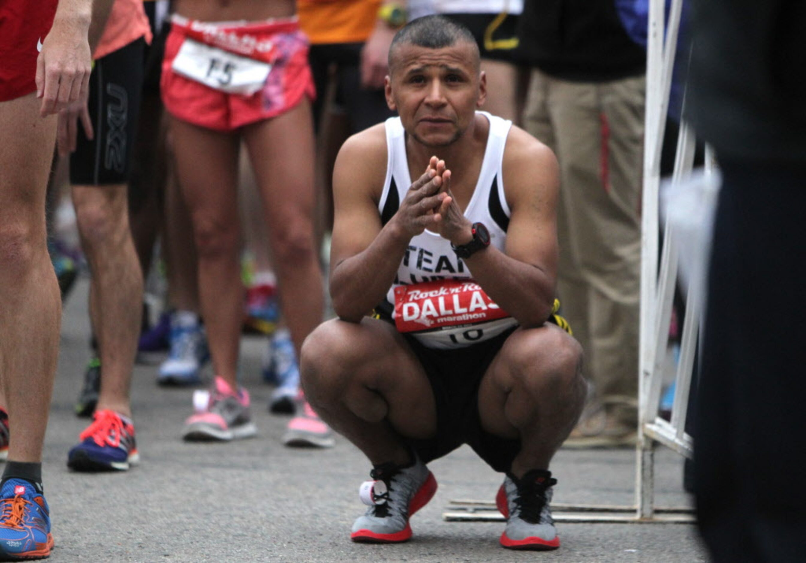 A runner prepares himself before the start of the Dallas Rock N' Roll half-marathon on...