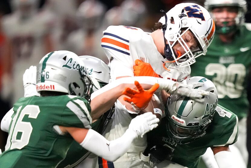 Frisco Wakeland’s Cooper Snyder fumbles as he is hit by Frisco Reedy defensive back Seth...