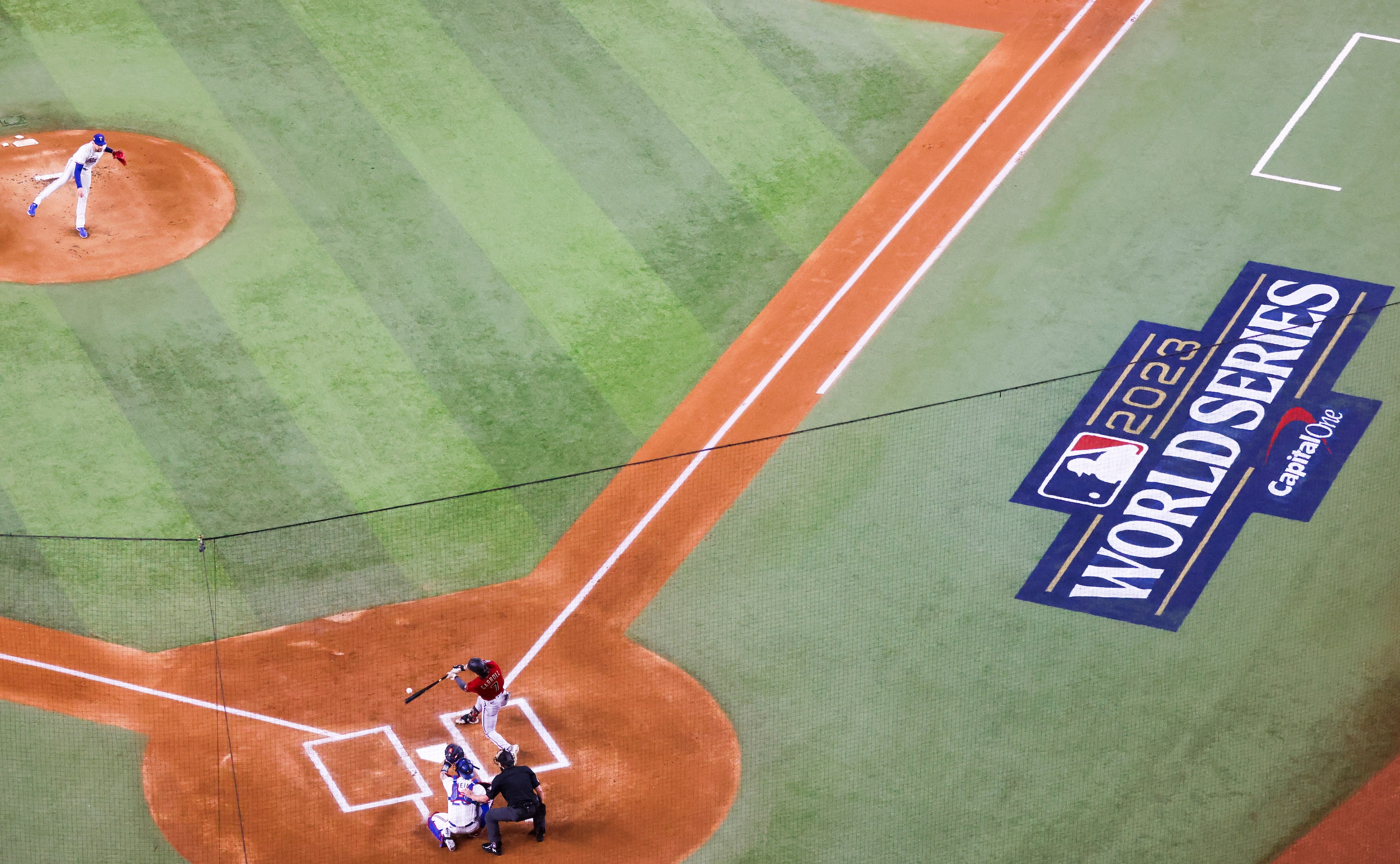 Arizona Diamondbacks’ Corbin Carroll fouls off the first pitch of the game from Texas...