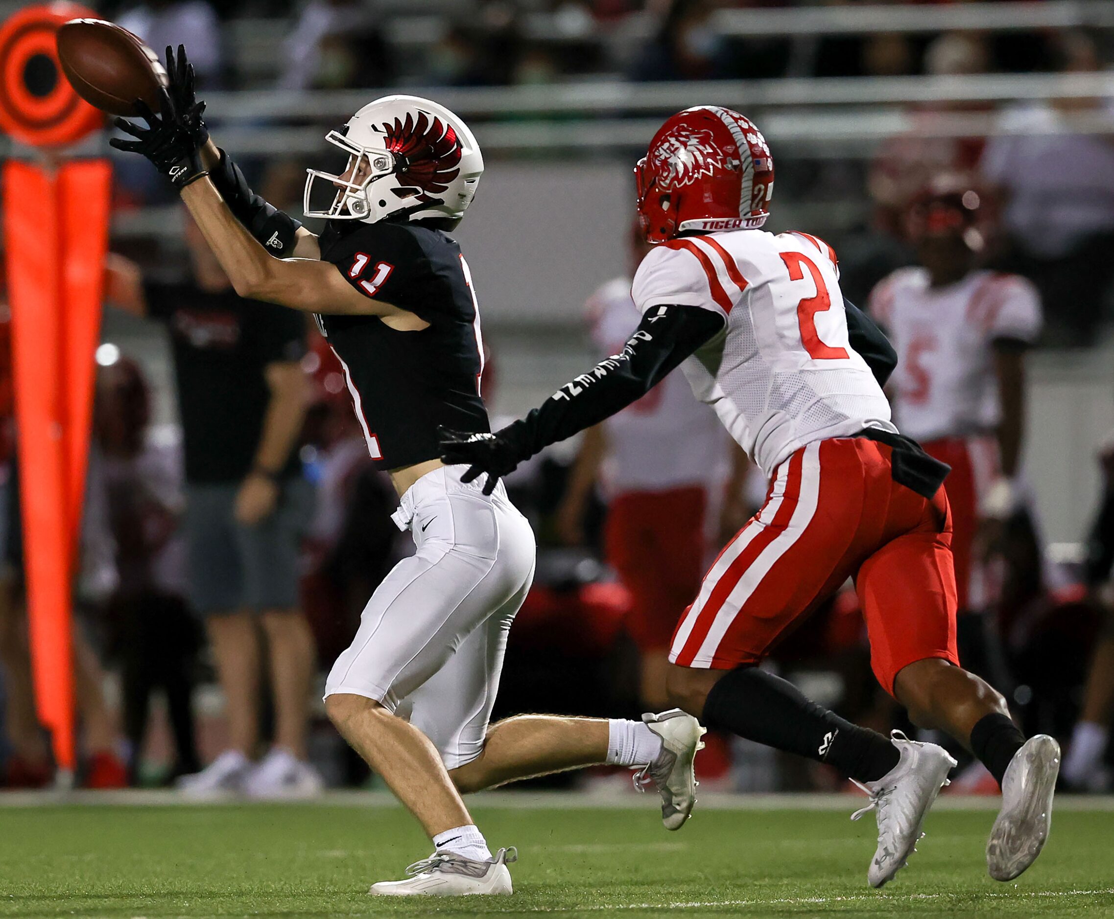 Argyle wide receiver Ward McCollum (11) comes up with a reception in front of Terrell...