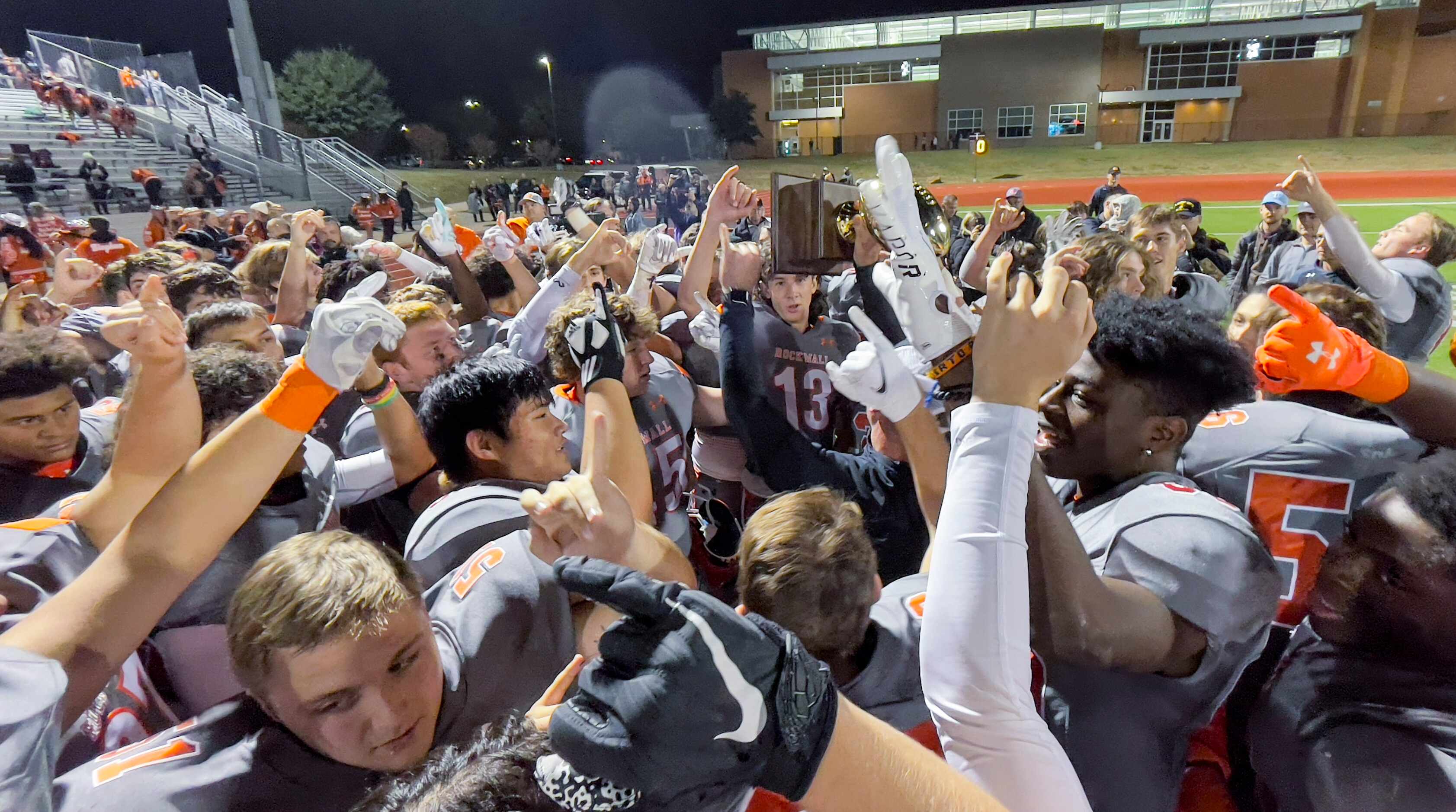 Rockwall celebrates a 55-14 win over North Garland in a Class 6A Division I bi-district...
