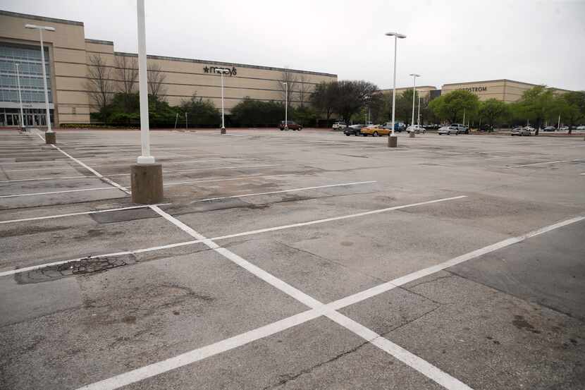 One of the parking lots in front of Macy's at NorthPark Center in Dallas was almost empty on...