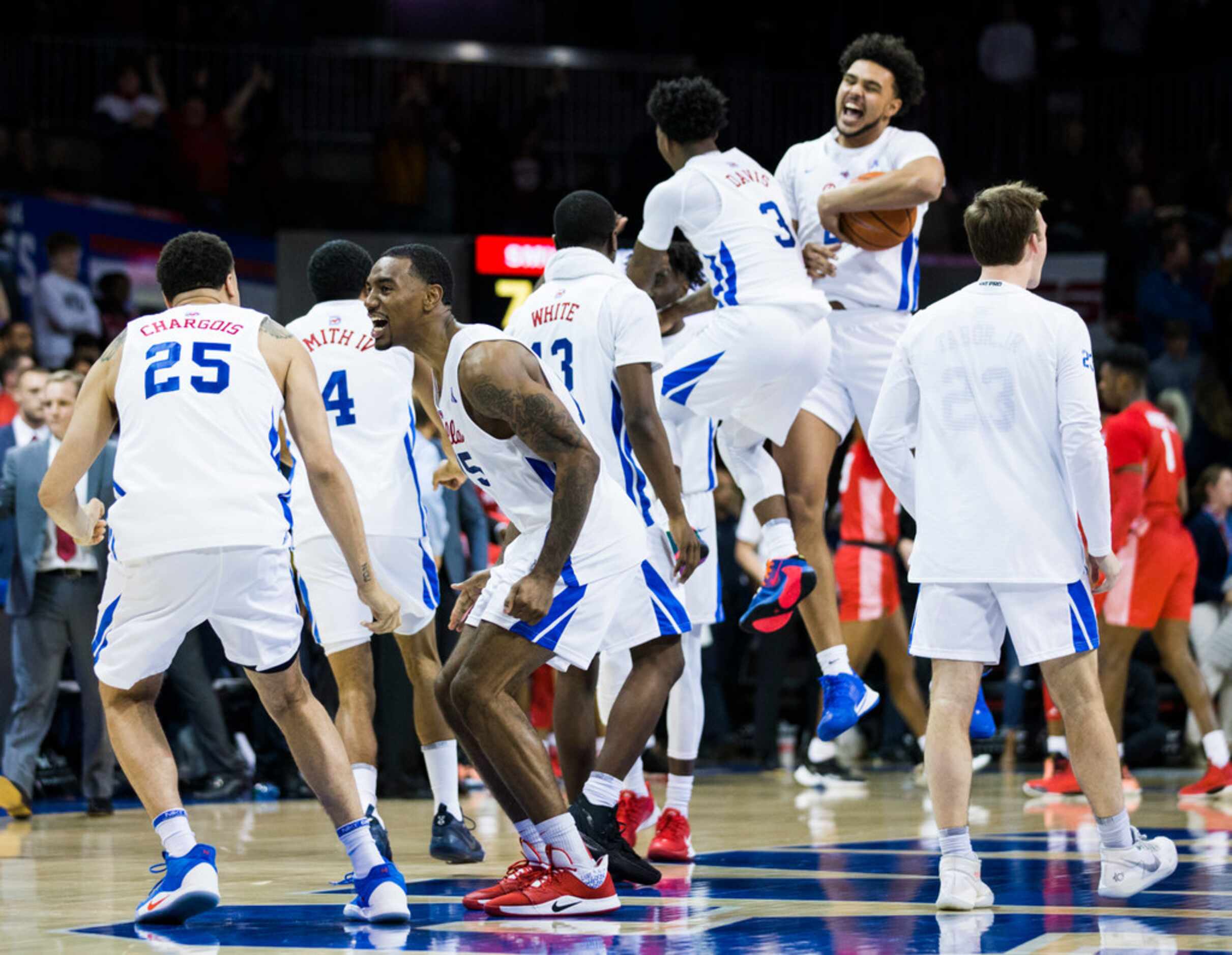 Southern Methodist Mustangs celebrates a 73-72 win in overtime of a basketball game between...