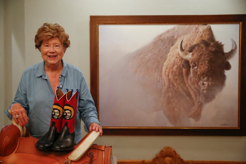 Longtime concessionaire Caroline Newport McKee poses in her Cedar Hill home with her Big Tex...