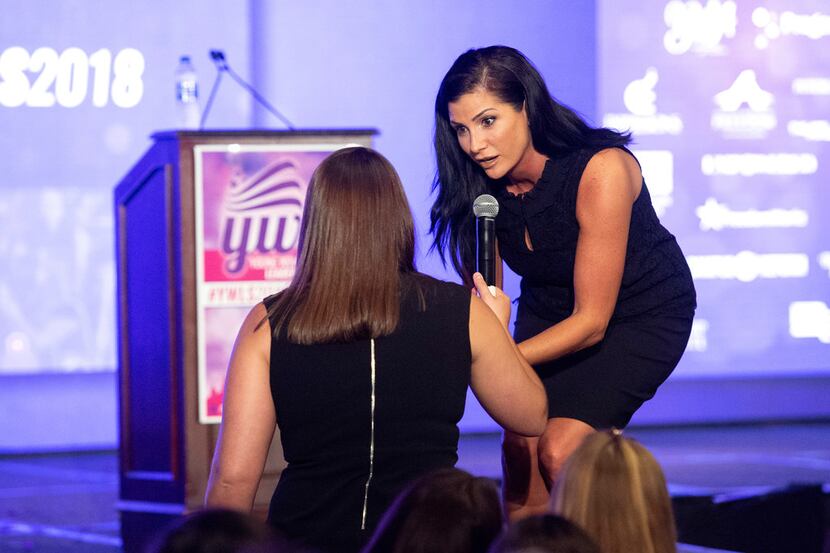 Dana Loesch signed a book for an attendee at the Turning Point USA Young Women's Leadership...