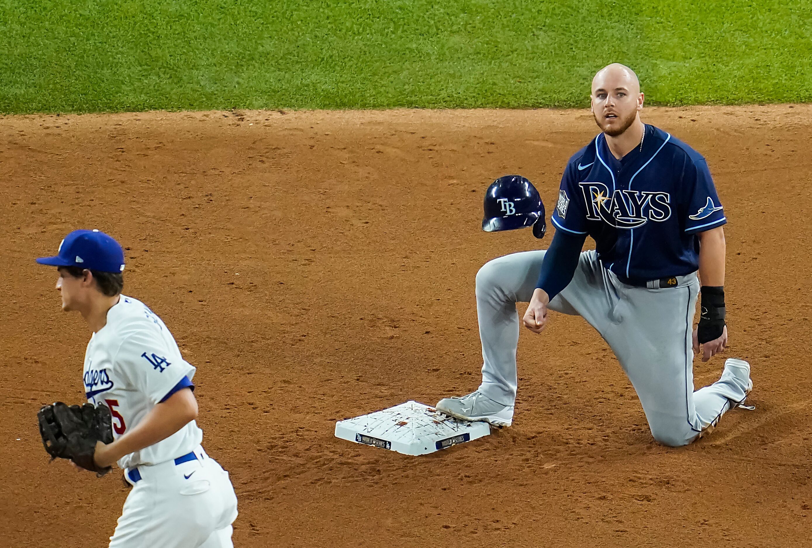 Tampa Bay Rays pinch hitter Michael Brosseau reacts after being doubled off of second base...