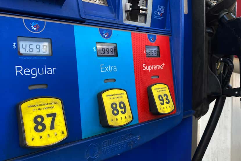 The price of gas shows on an Exxon gas pump at the 7-Eleven at 724 Hebron Parkway in...