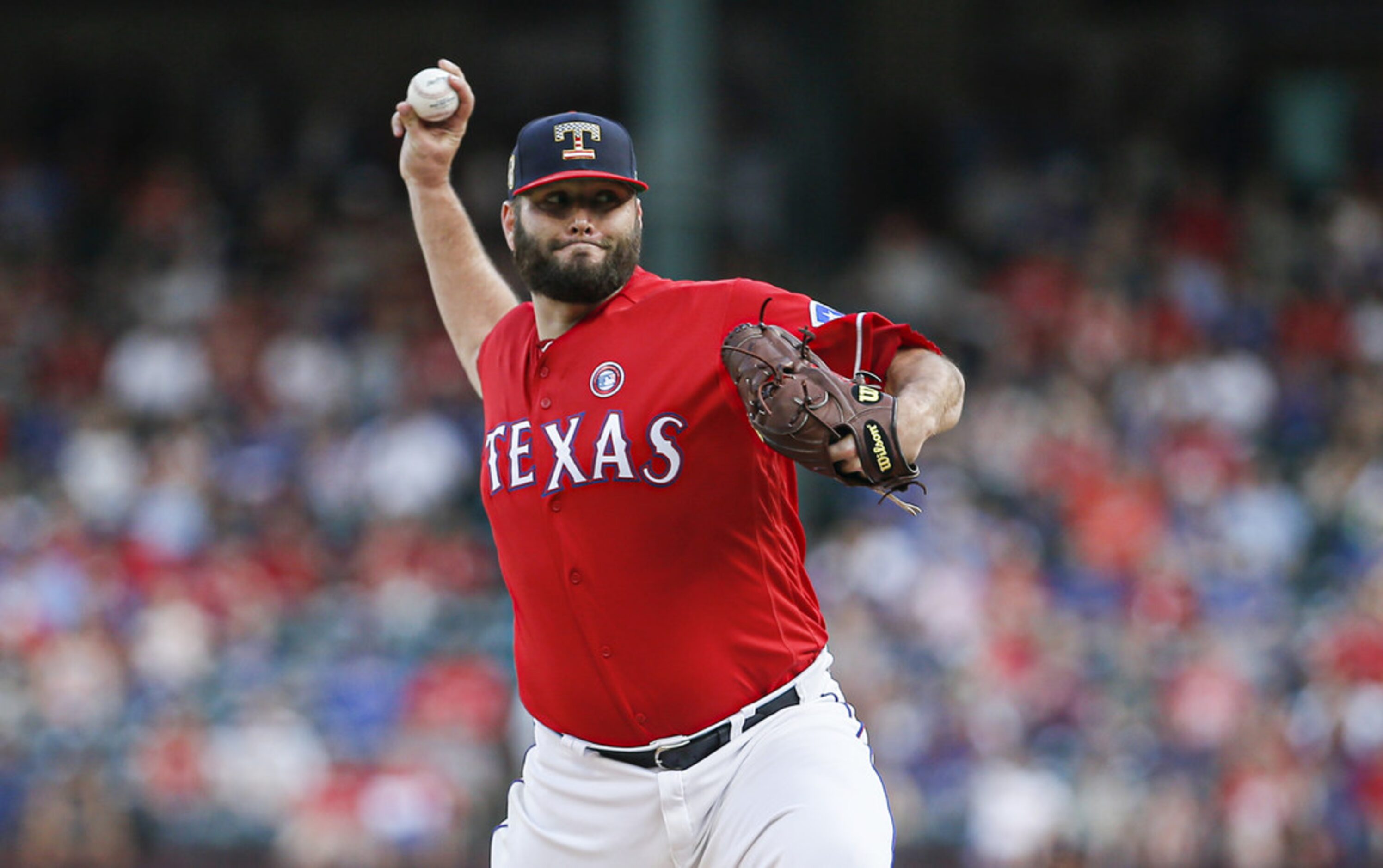 ARLINGTON, TX - JULY 4: Starting pitcher Lance Lynn #35 of the Texas Rangers throws during...