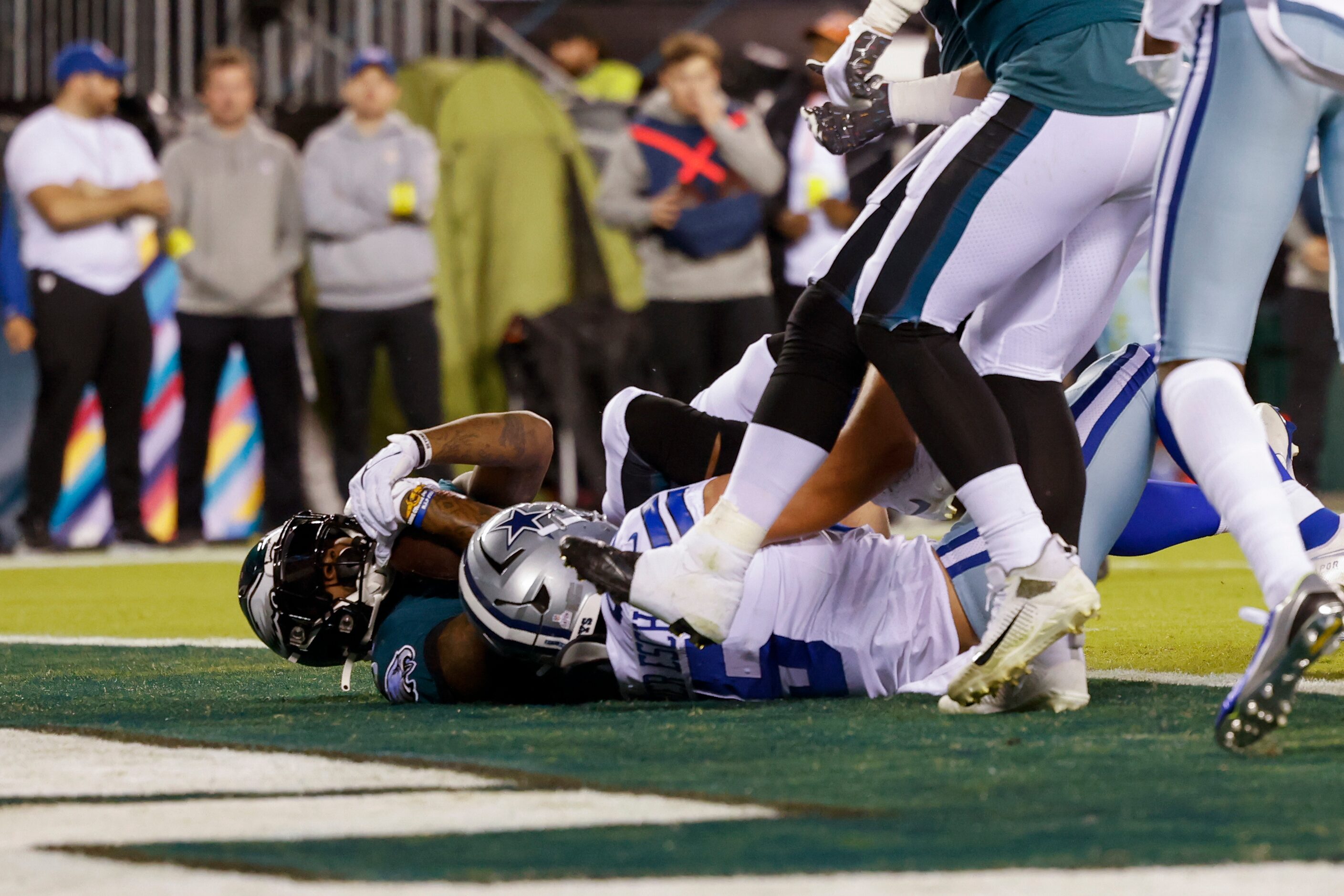 Philadelphia Eagles running back Miles Sanders (26) falls into the end zone for a touchdown...