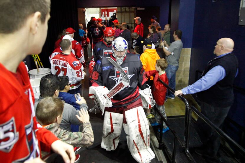Allen Americans goal keeper Riley Gill comes out of the locker room to take the ice for the...