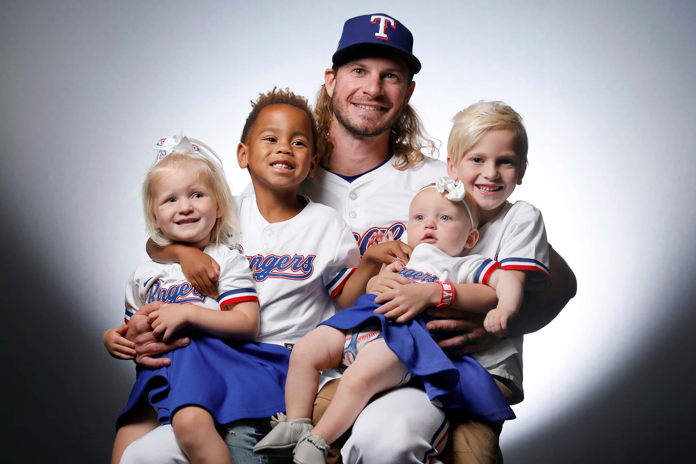 Texas Rangers Travis Jankowski pictured with children (from left) Radleigh, Jett, Wrenlyn...
