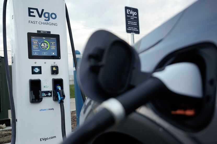An electric vehicle charges at an EVgo fast charging station in Detroit on Nov. 16.