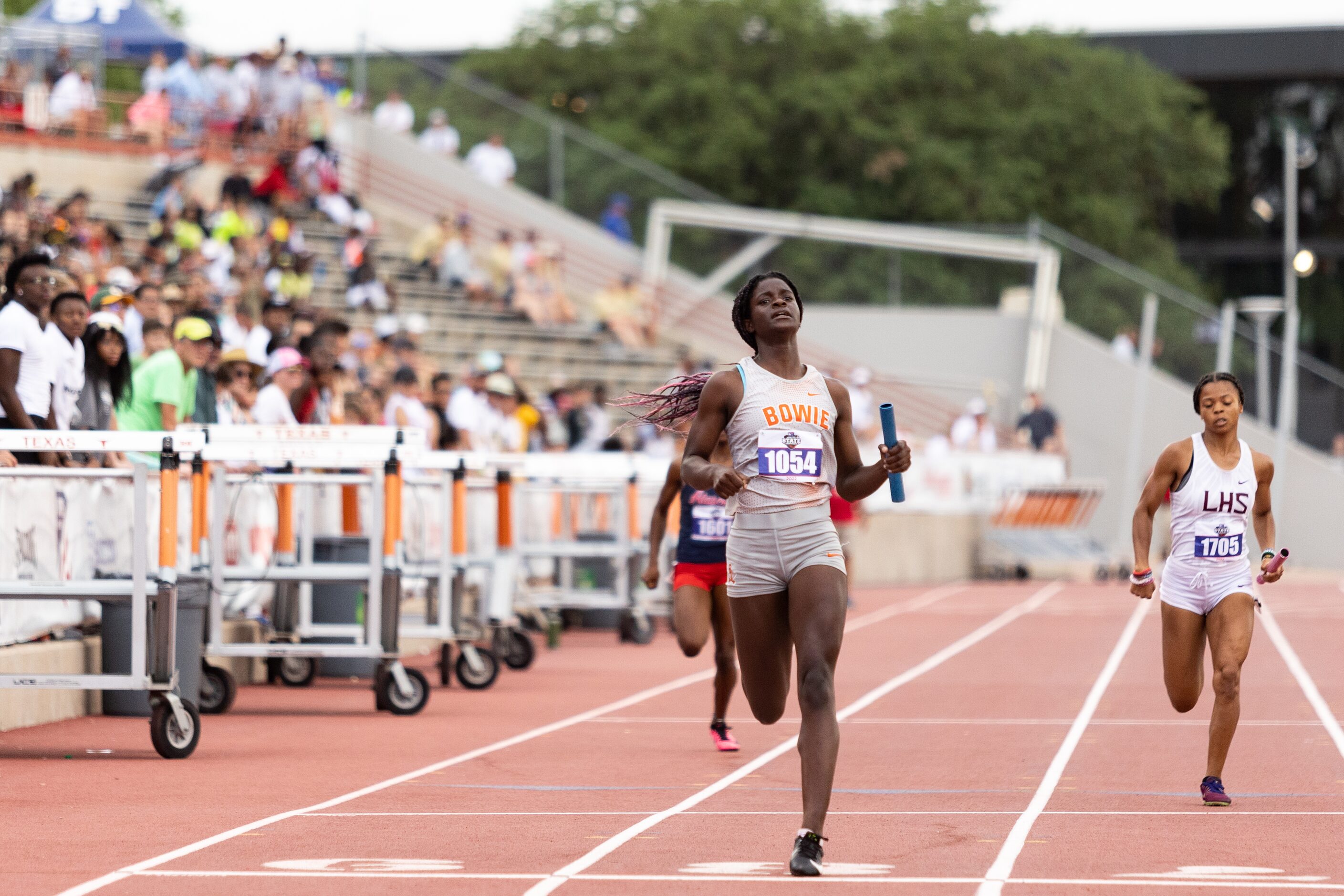 Bailey Johnson of Arlington Bowie races to the finish in the girls’ 4x200-meter relay at the...