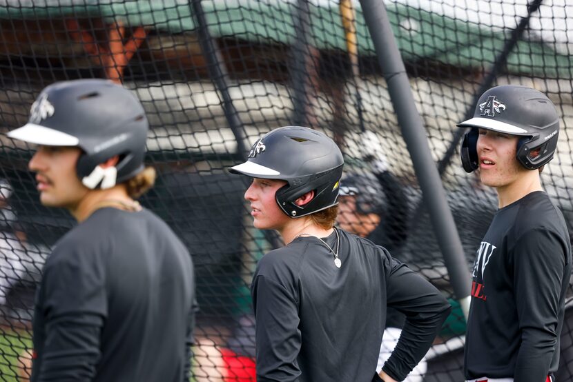 Argyle freshman Grady Emerson (right) waits for batting practice alongside his teammates on...