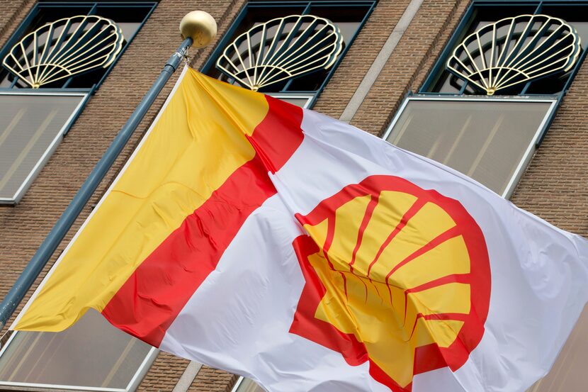 A flag bearing the company logo of Royal Dutch Shell, an Anglo-Dutch oil and gas company,...