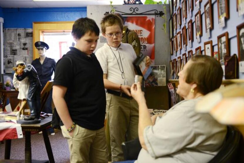 
 Ballard shares Royse City history with Tanner (left) and Nick at the Zaner Robison...