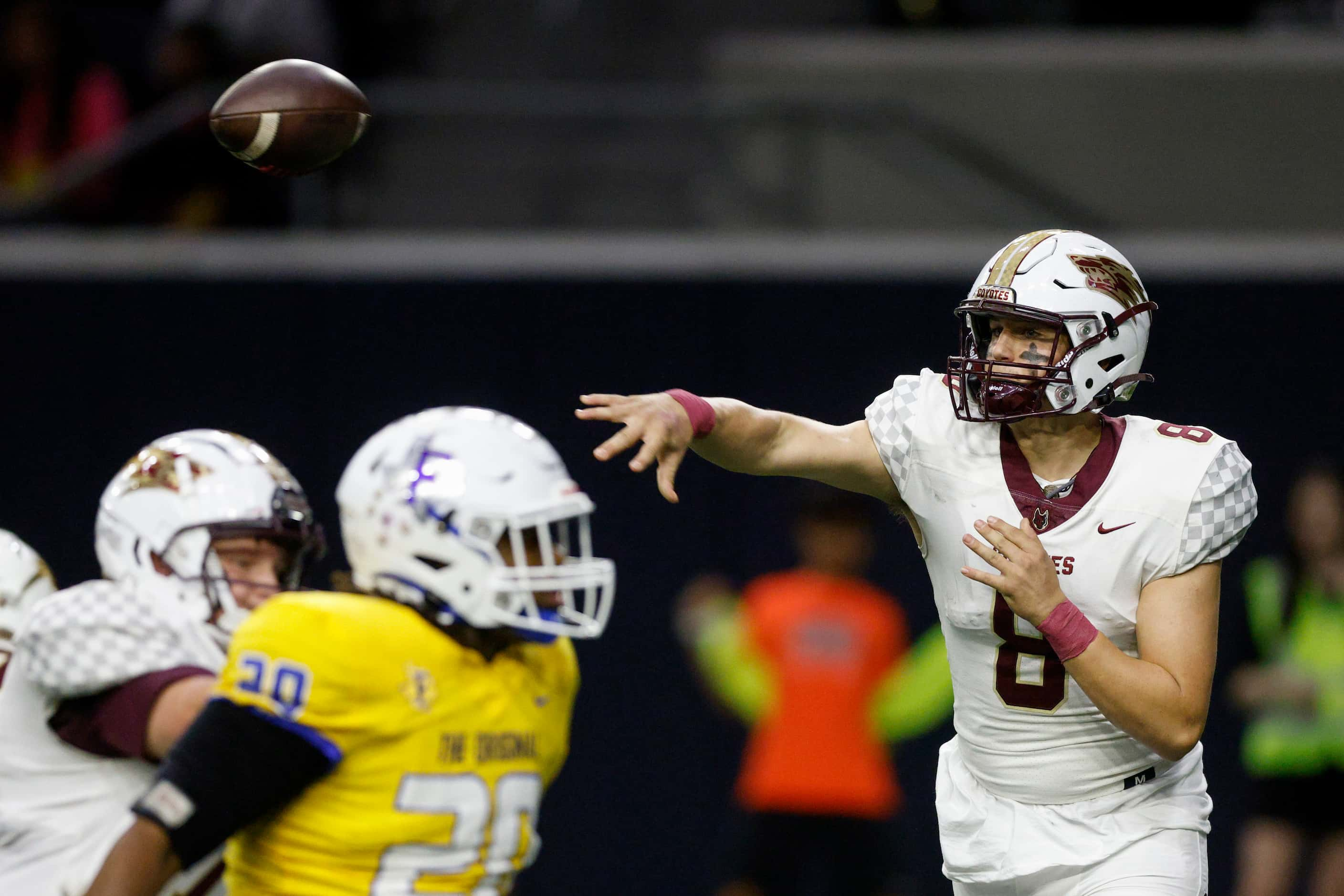 Frisco Heritage quarterback Bryce Gilchrist (8) throws a pass in the pocket during the first...