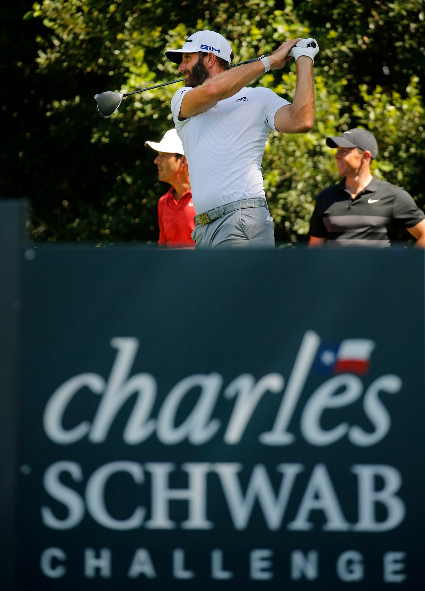 PGA golfer Dustin Johnson tees off on No. 12 during the Charles Schwab Challenge practice...