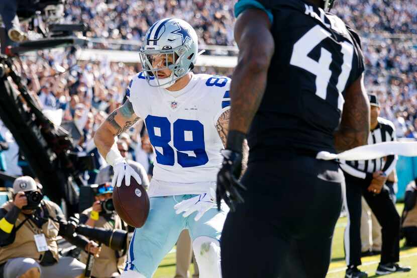 Dallas Cowboys tight end Peyton Hendershot (89) stops in the end zone after catching a...