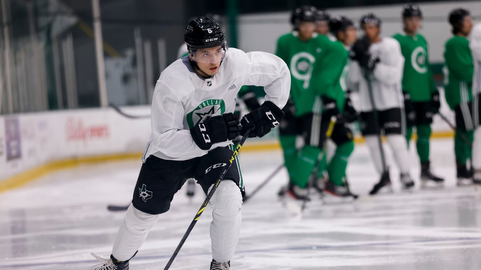 Christian Kyrou (6) participates in a drill during the Stars’ annual development camp Group...