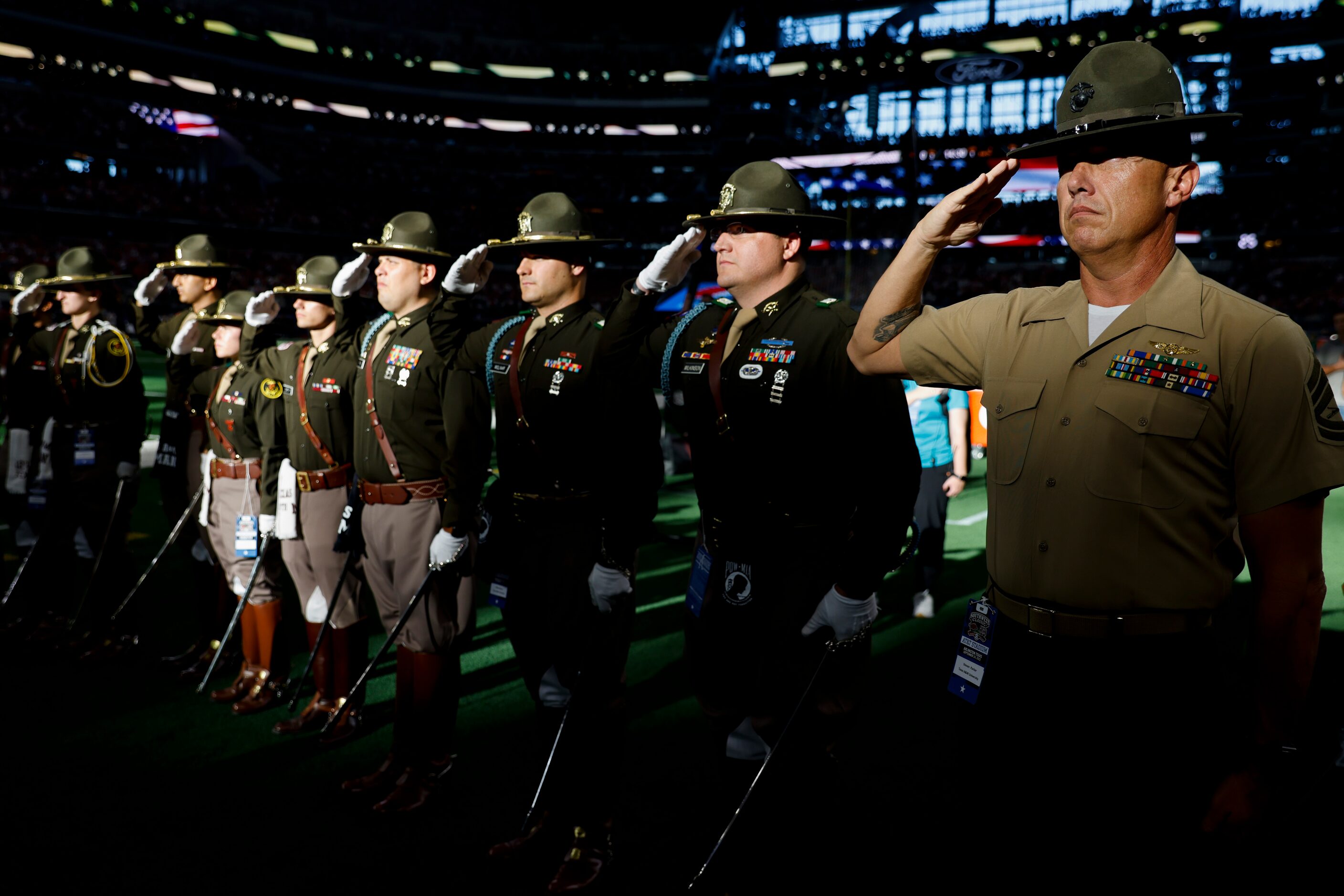 The Texas A&M Corps of Cadets participate in the National Anthem ahead of the first half of...