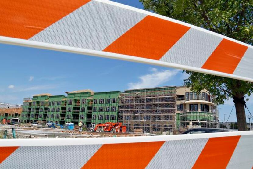 
Last year, construction crews were busy working at West Plano Village, where a four-story...
