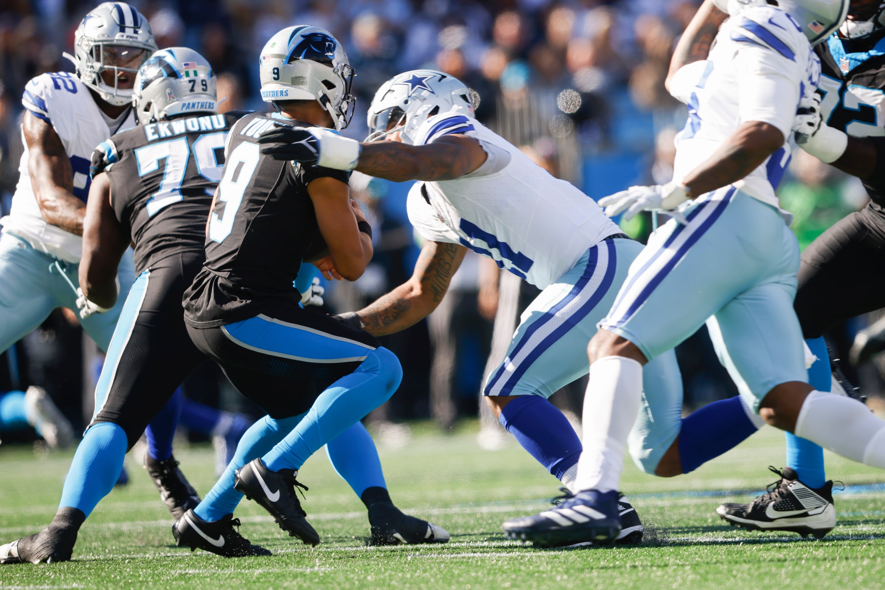 Dallas Cowboys linebacker Micah Parsons (11) sacks Carolina Panthers quarterback Bryce Young...