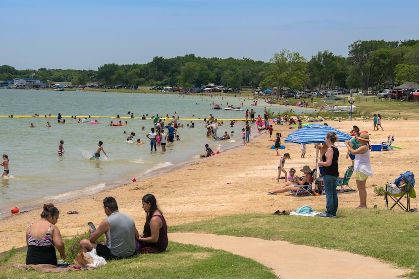 On the shore of Joe Pool Lake, Loyd Park's beach is popular during the summer. 