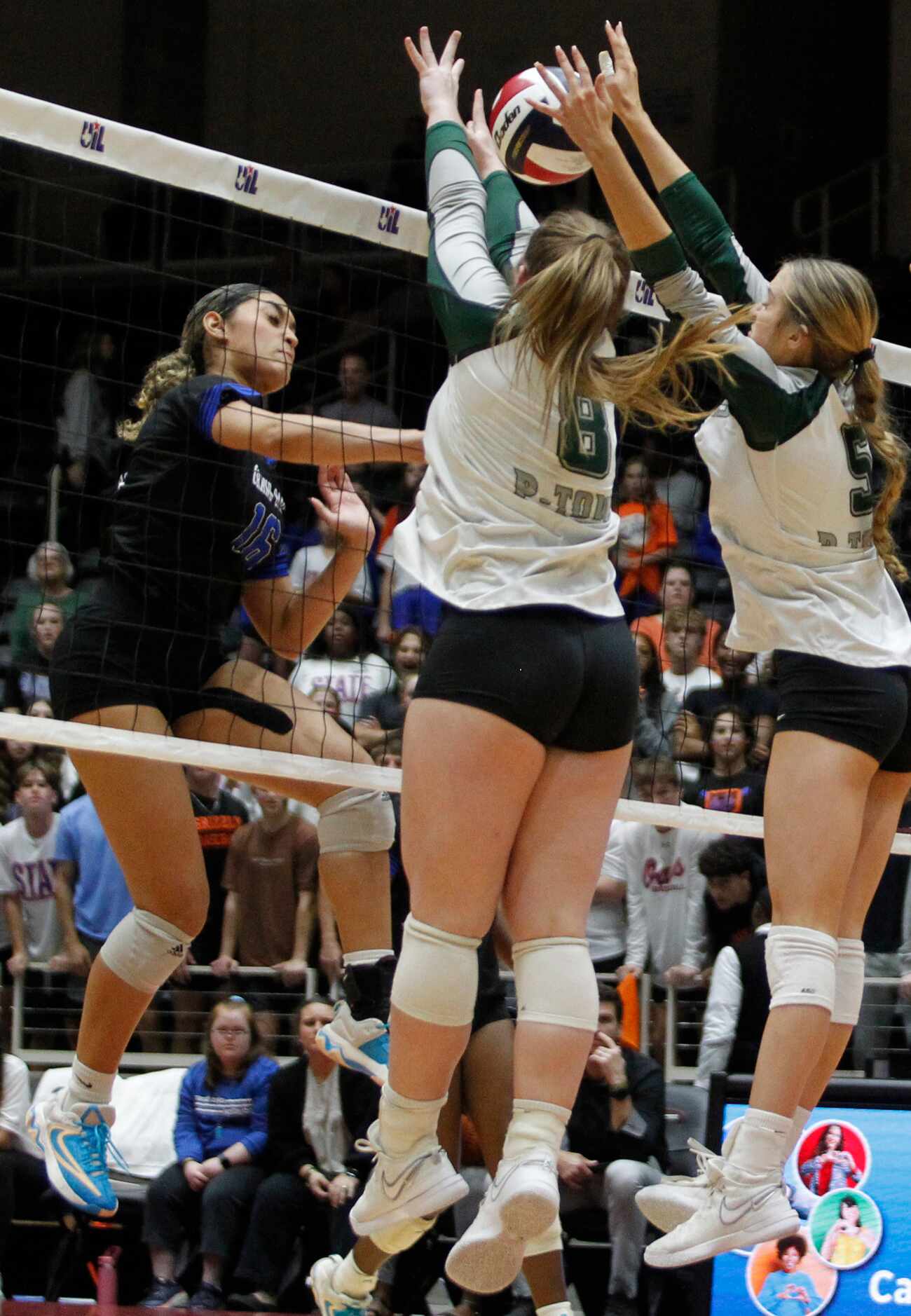 Prosper defenders Sydney Thornton (5), right, and Reese Renfrow (8), center, team up to...