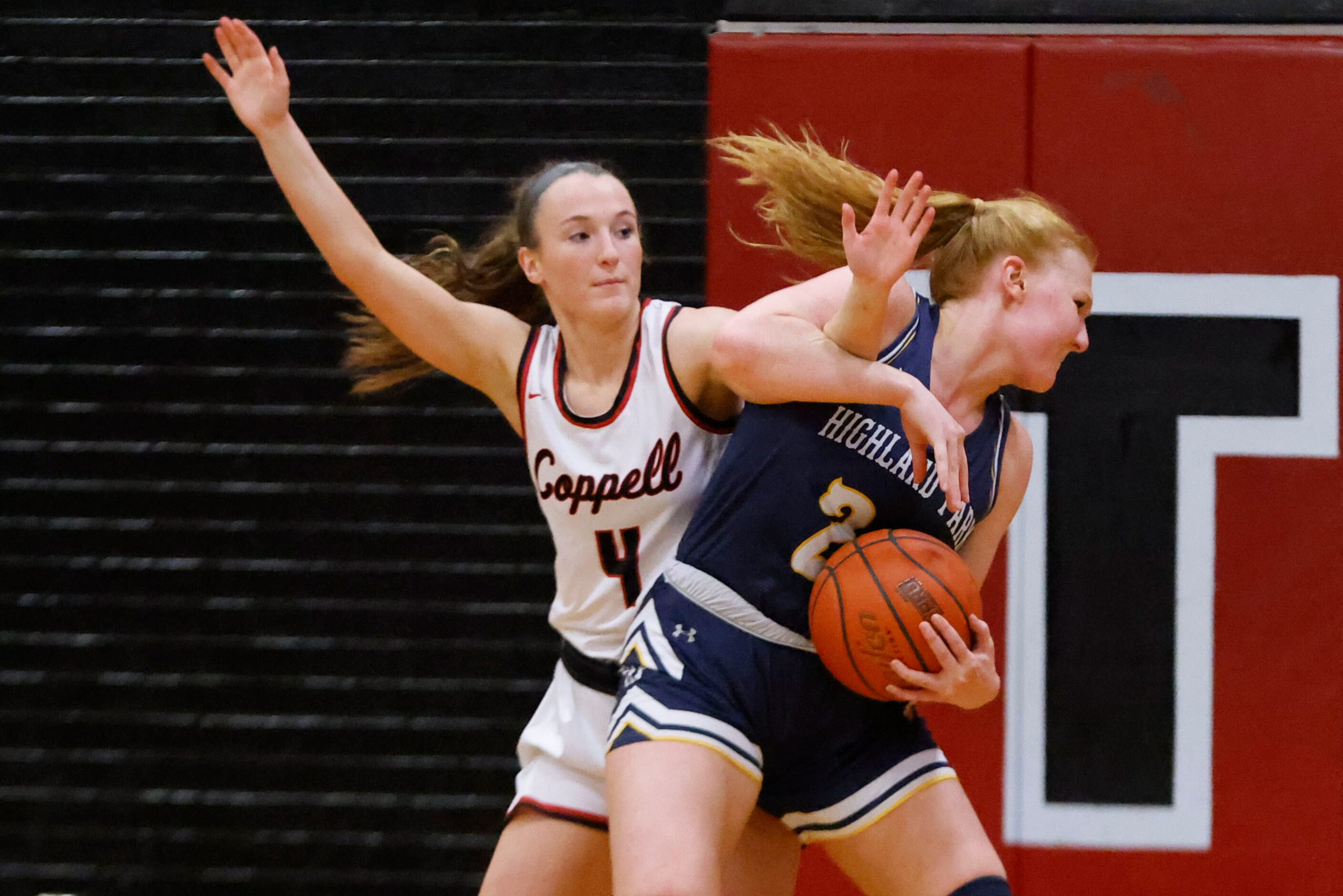 Coppell’s Allyssa Potter (4) fouls Highland Park’s  Kate Jackson (right, during the second...