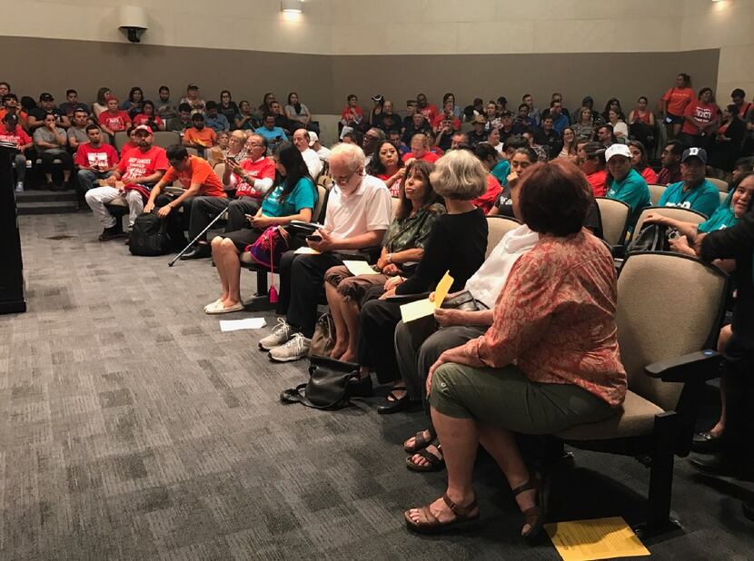 Carrollton residents and immigrant advocates gathered at Carrollton City Hall in July to...