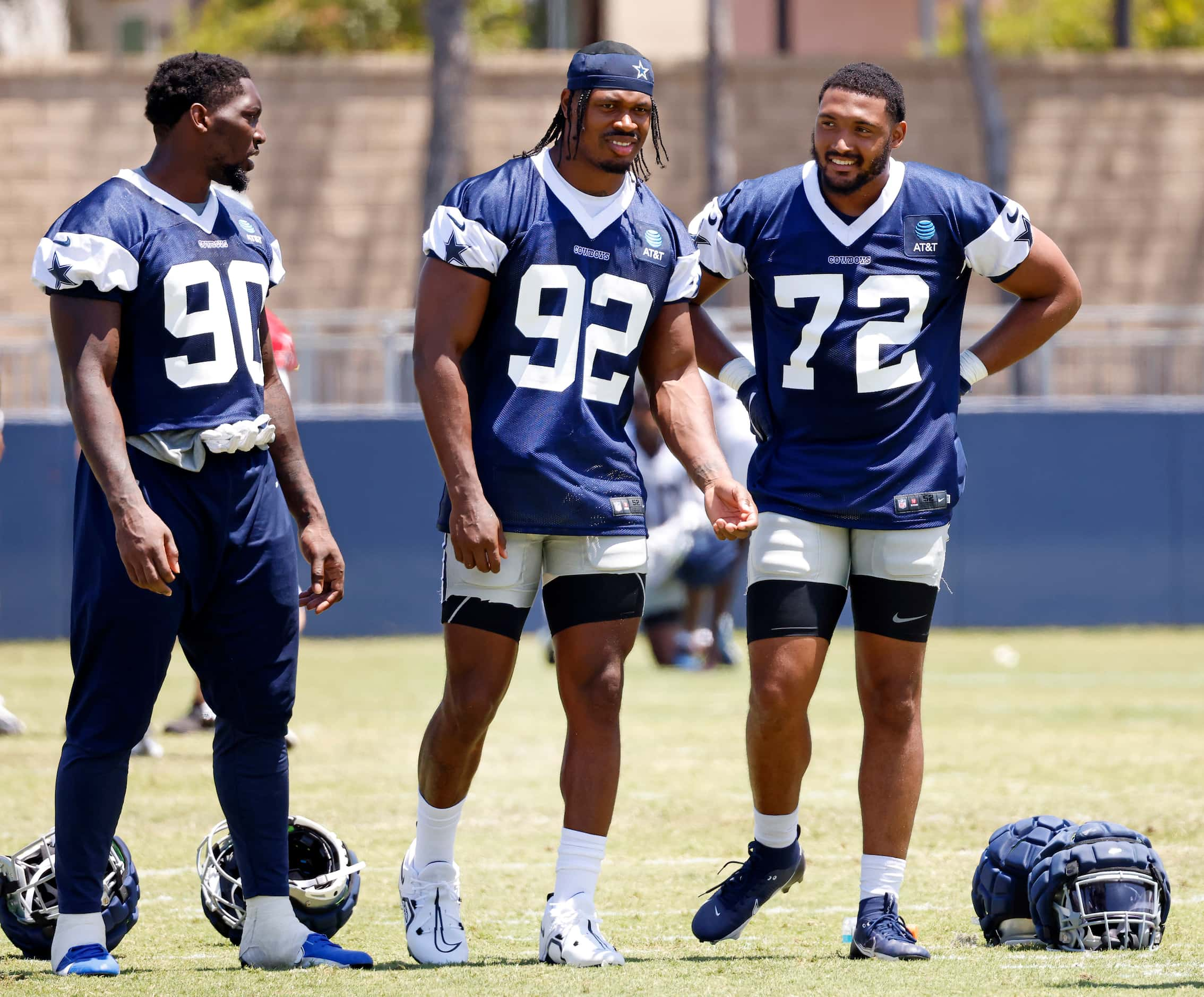 Dallas Cowboys newly singed defensive ends Shaka Toney (72) and Al-Quadin Muhammad (92)...