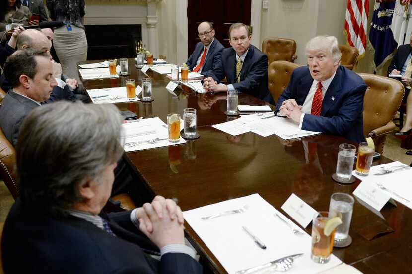 President Donald Trump discusses the federal budget over lunch in the Roosevelt Room of the...