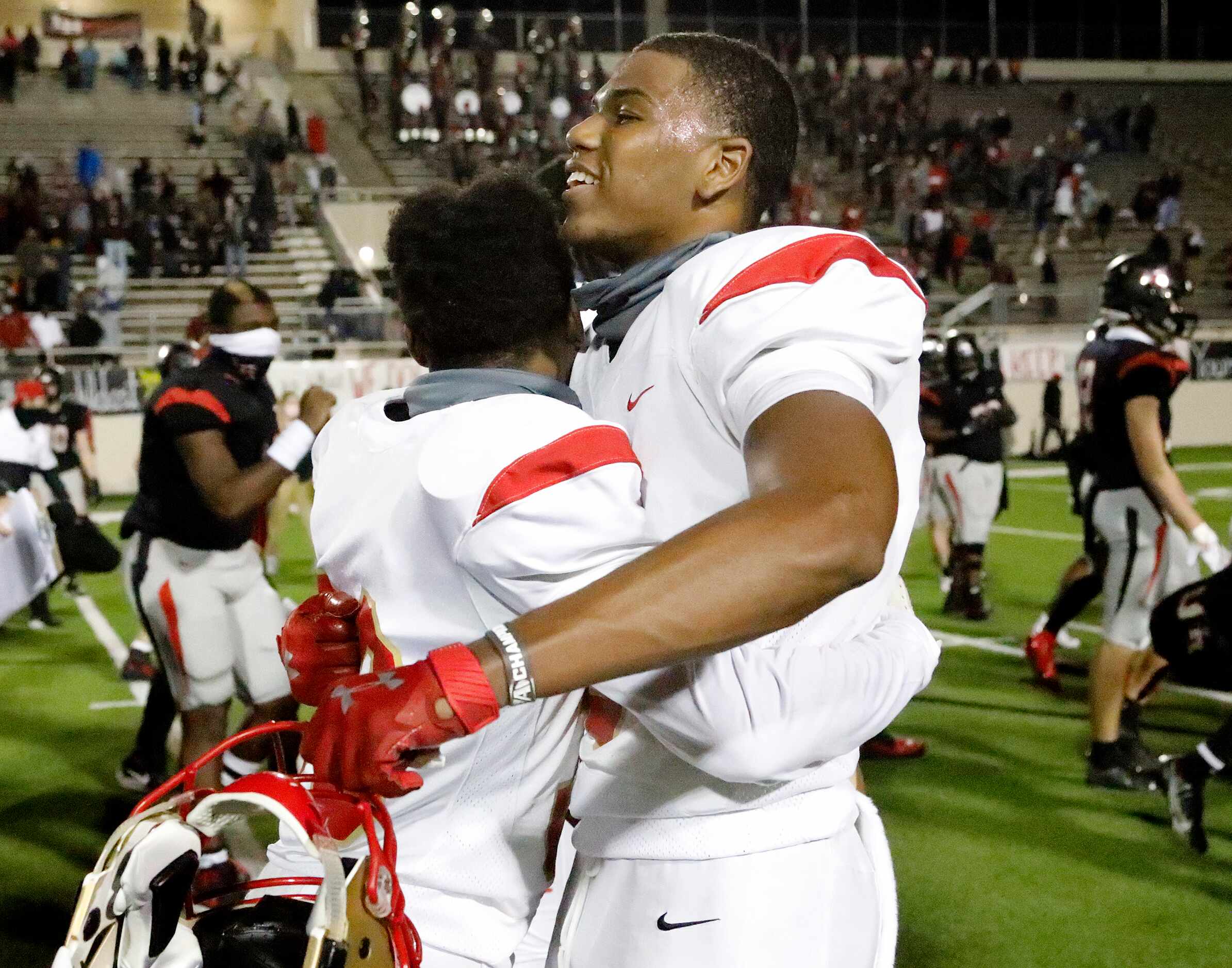 South Grand Prairie High School strong safety Jaden Robinson (3) embraces South Grand...