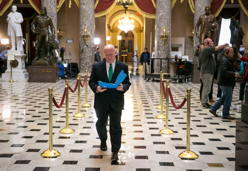 Rep. Kevin Brady, R-The Woodlands, heads to a meeting with House Speaker Paul Ryan, R-Wis.,...