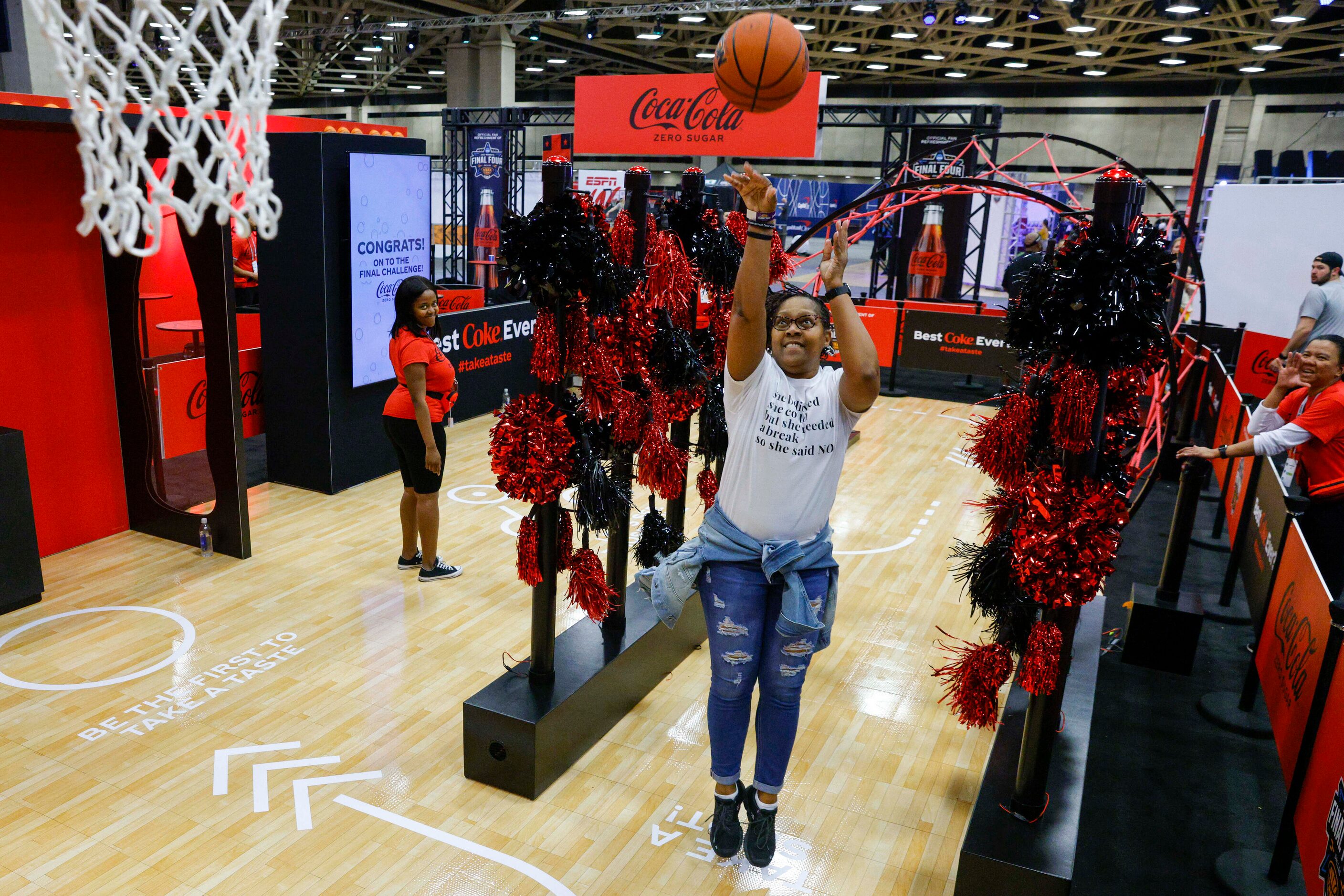 Linda Copeland of Nashville shoots a basketball during a skills challenge at the NCAA...