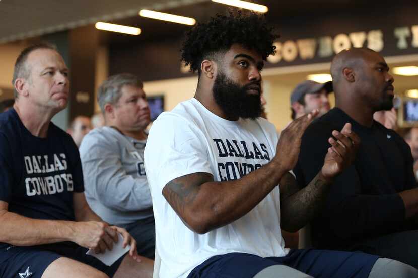 Dallas Cowboys running back Ezekiel Elliott applauds after a tribute video to Dallas Cowboys...