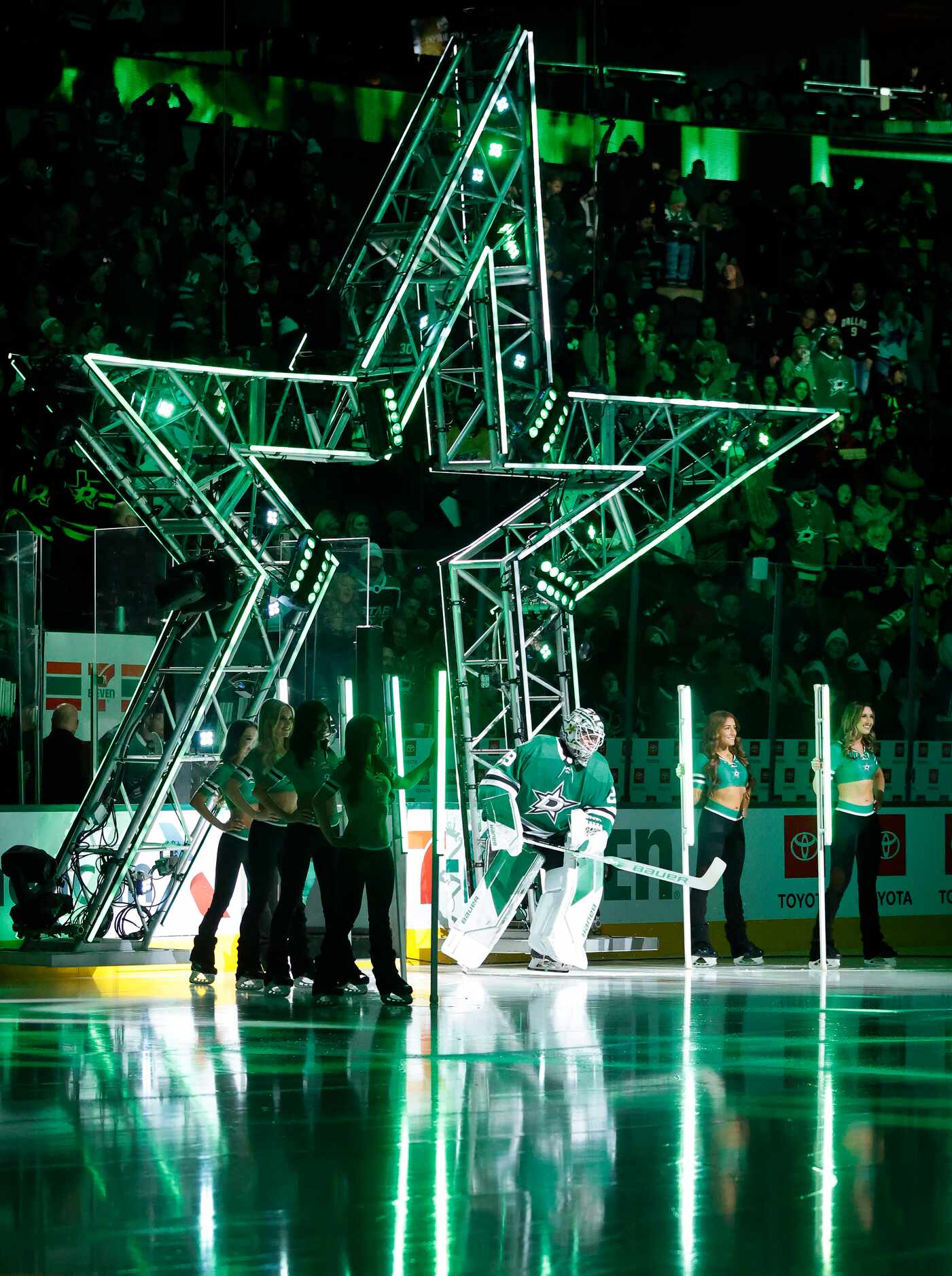 Dallas Stars goaltender Jake Oettinger (29) takes the ice for his first game back since an...