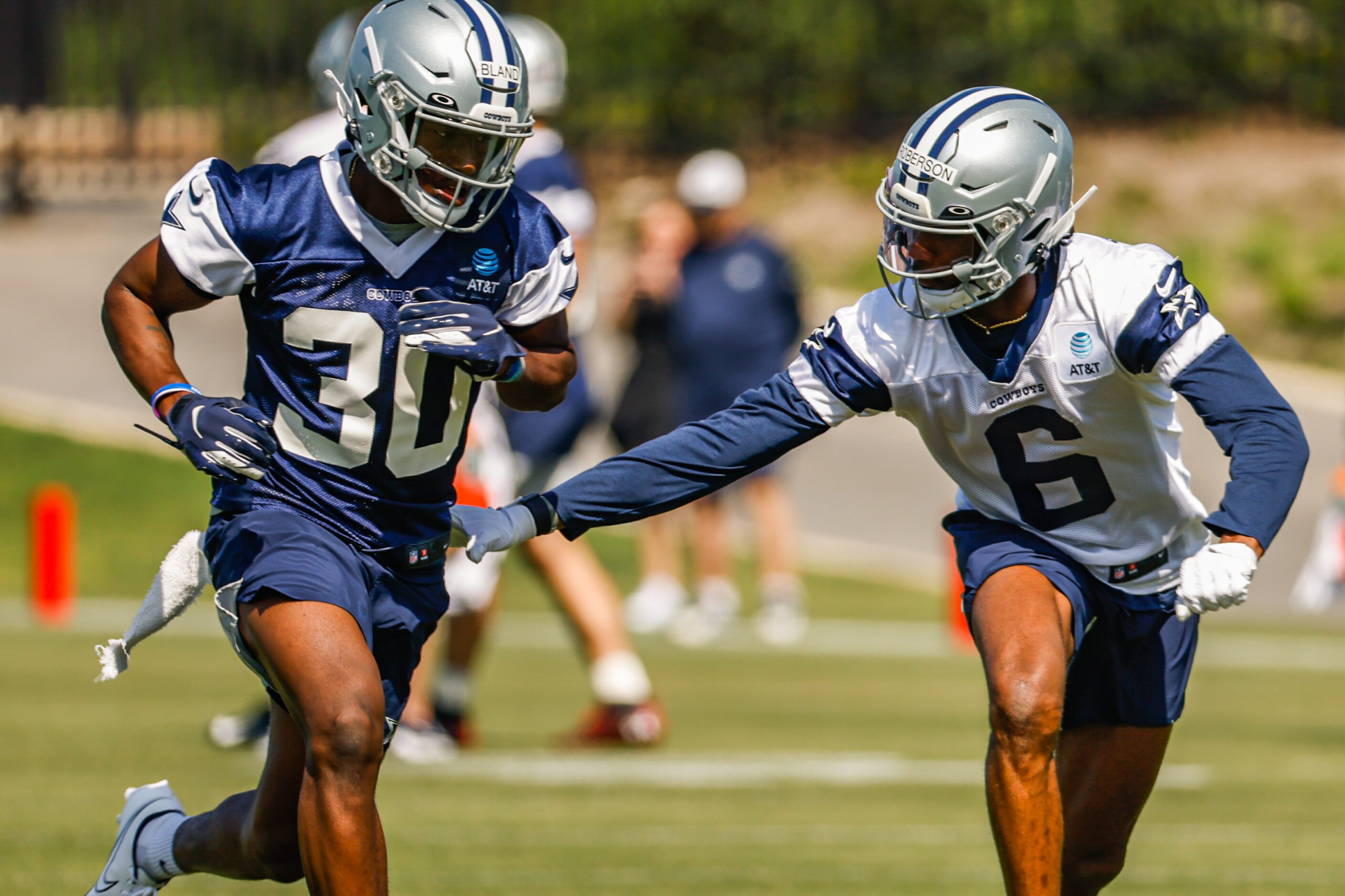 Dallas Cowboys cornerback (30) DaRon Bland and wide receiver (6) Jaquarii Roberson during a...