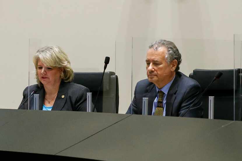 Dallas Dallas City Council member Cara Mendelsohn (left) and city attorney Chris Caso listen...