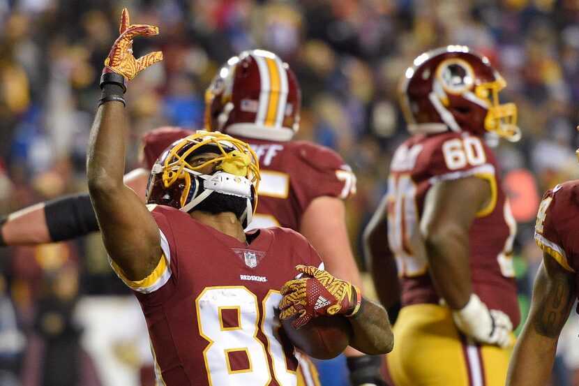 Washington Redskins wide receiver Jamison Crowder (80) celebrates his touchdown catch during...