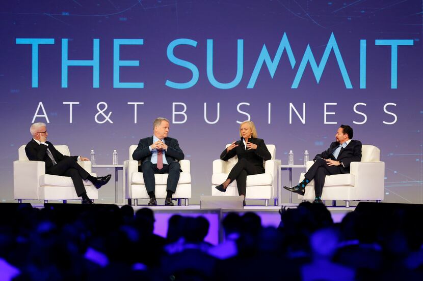 CNN's Anderson Cooper (from left) talks with Doug Parker of American Airlines, Meg Whitman...