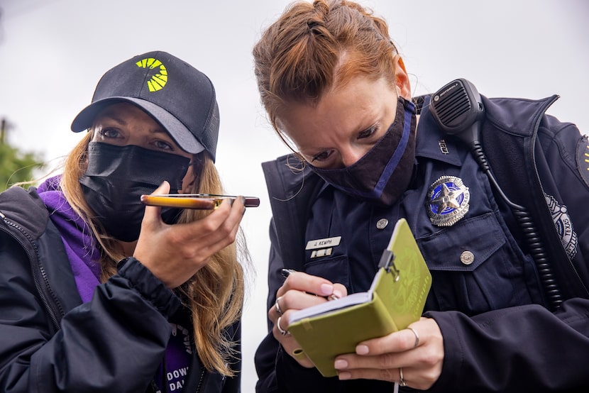 Homeless outreach coordinator Samantha Moran (left) and Dallas police Officer Jennafer Kemph...