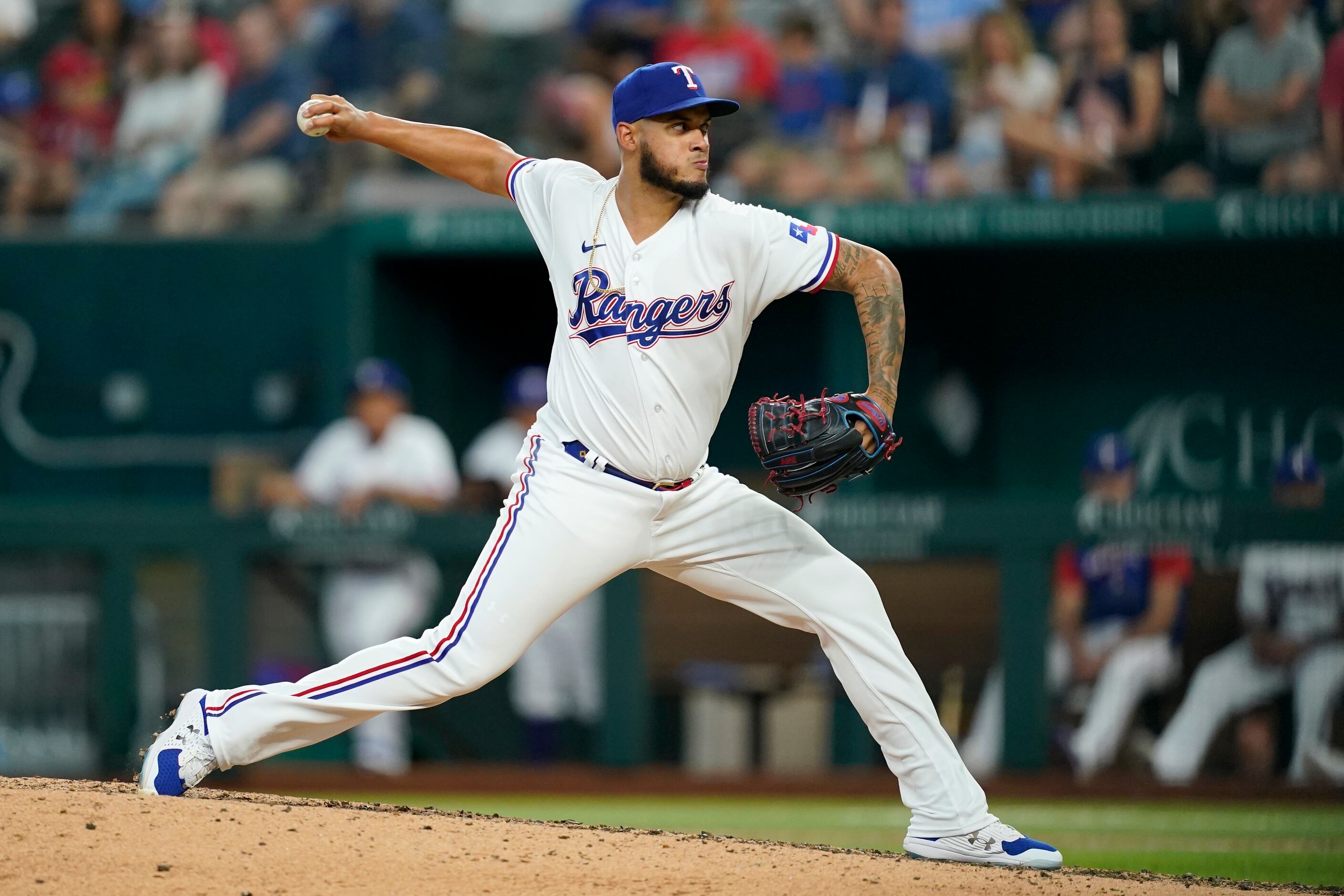 Texas Rangers pitcher Jonathan Hernandez throws during the ninth