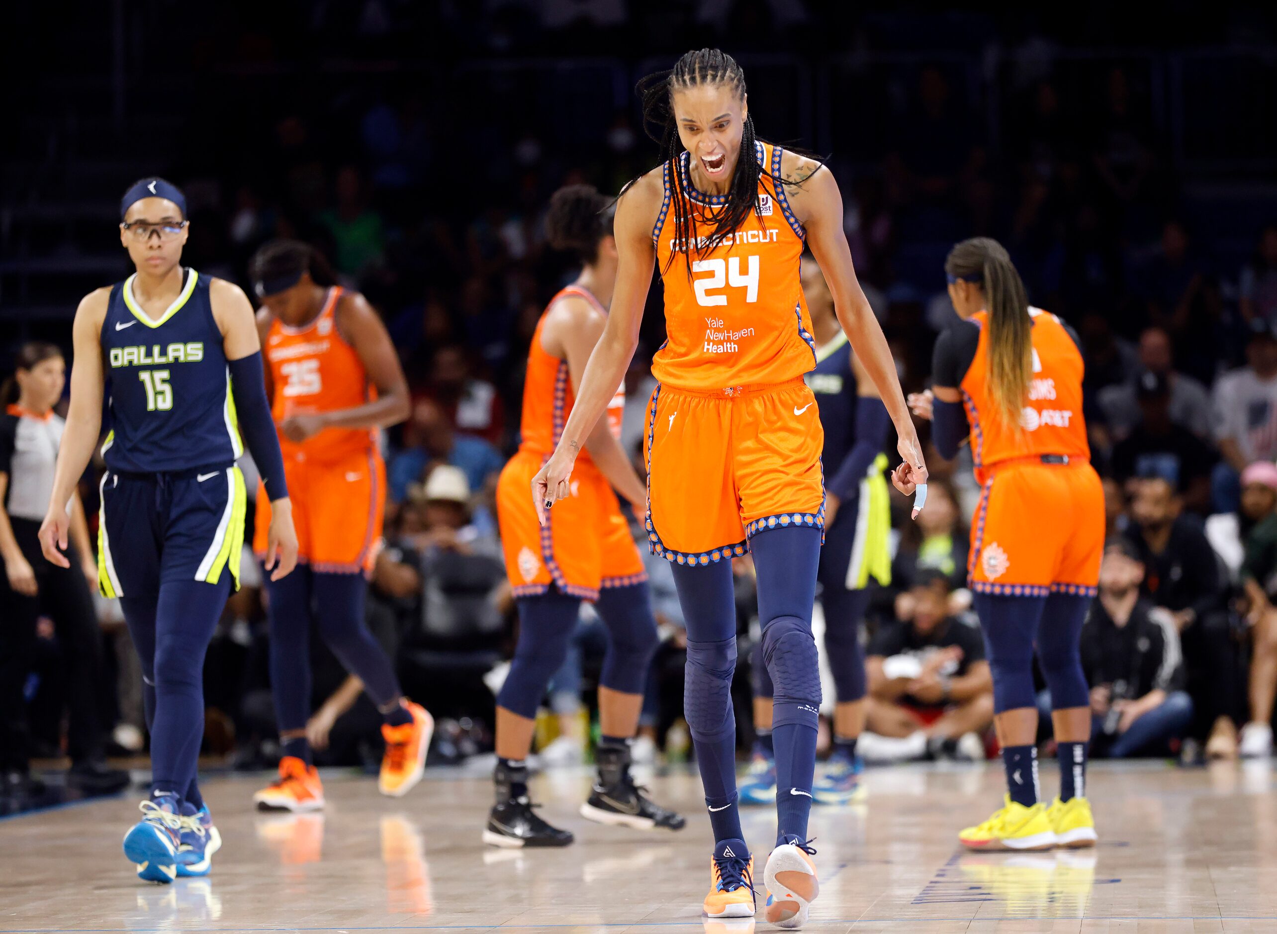 Connecticut Sun forward DeWanna Bonner (24) exhaults following a Dallas Wings turnover...