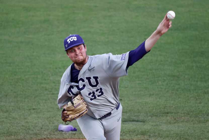 TCU pitcher Russell Smith (33) pitches against the DBU during the second inning of the NCAA...