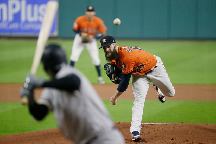 HOUSTON, TX - OCTOBER 13:  Dallas Keuchel #60 of the Houston Astros pitches in the first...
