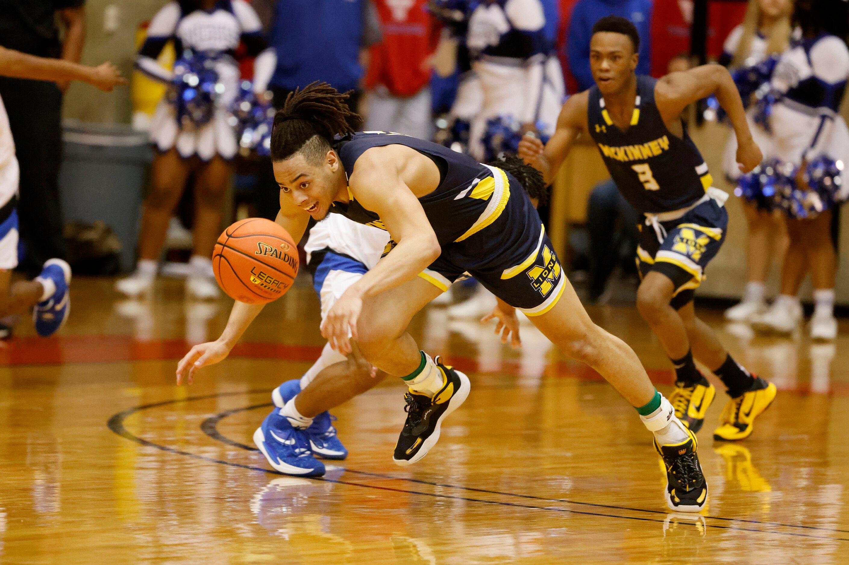 McKinney’s Devin Vincent steals the ball from a North Crowley defender during the second...