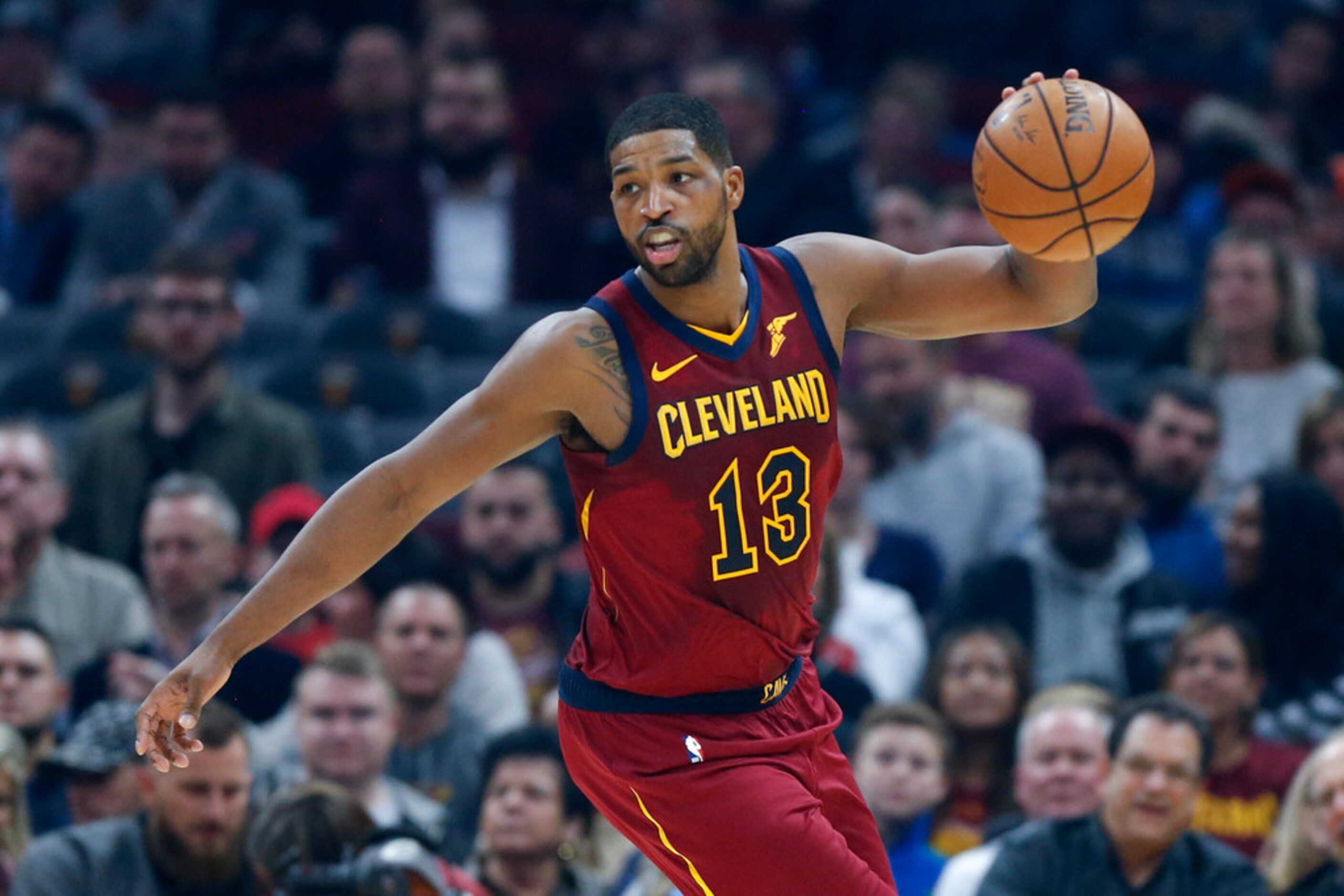 Cleveland Cavaliers' Tristan Thompson grabs a rebound against the Dallas Mavericks in the...