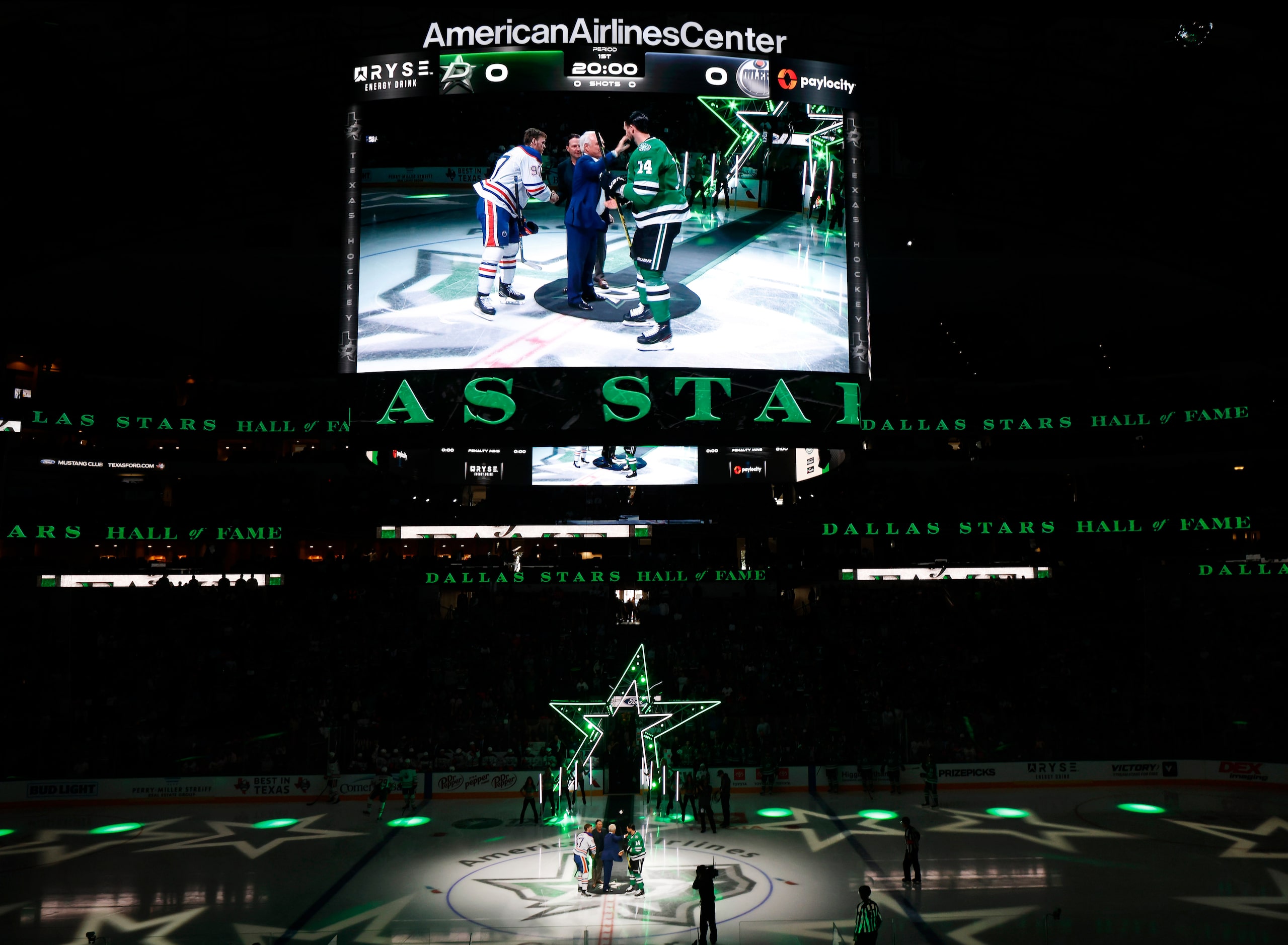 Dallas Stars Hall of Fame inductees, former Dallas Stars president Jim Lites (left) and...